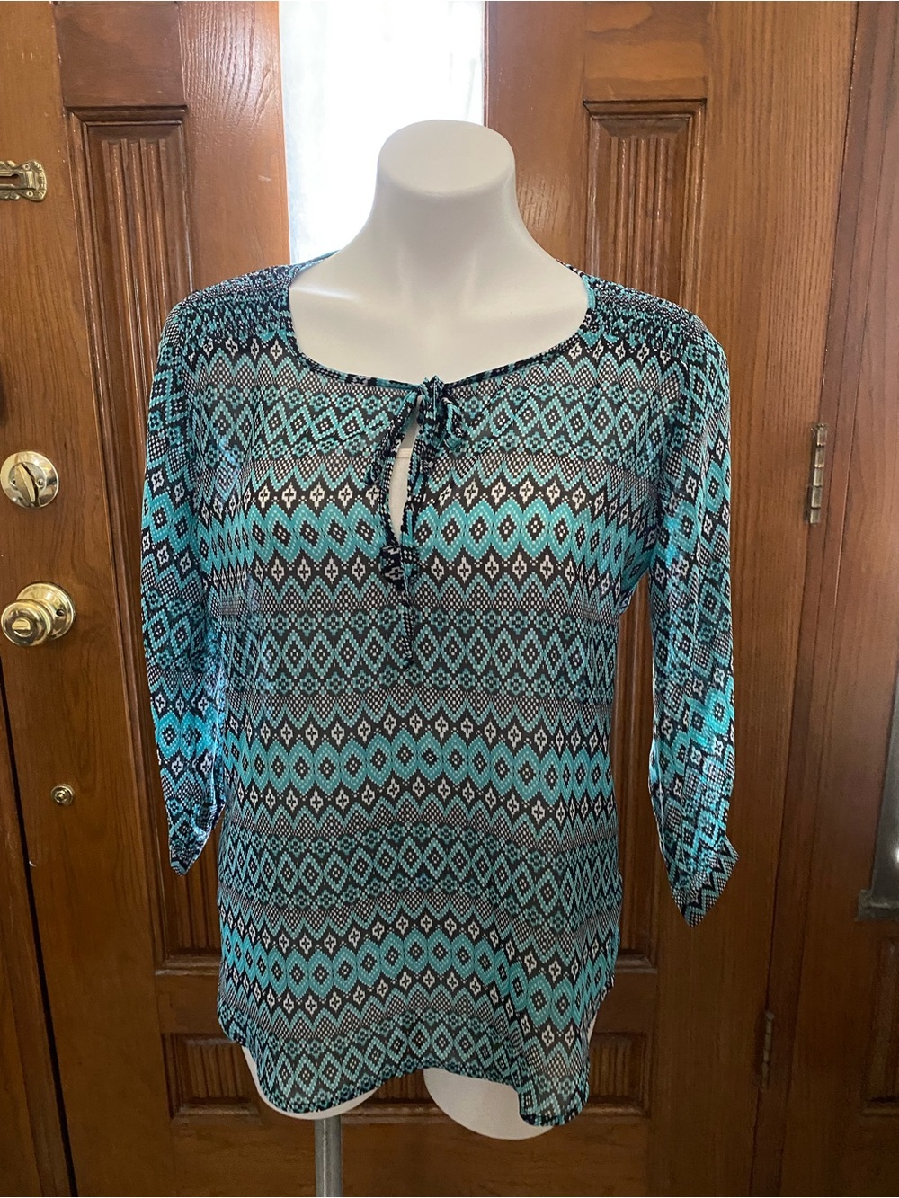 HeartSoul Teal and Black Geometric Tie-Neck Tunic Blouse